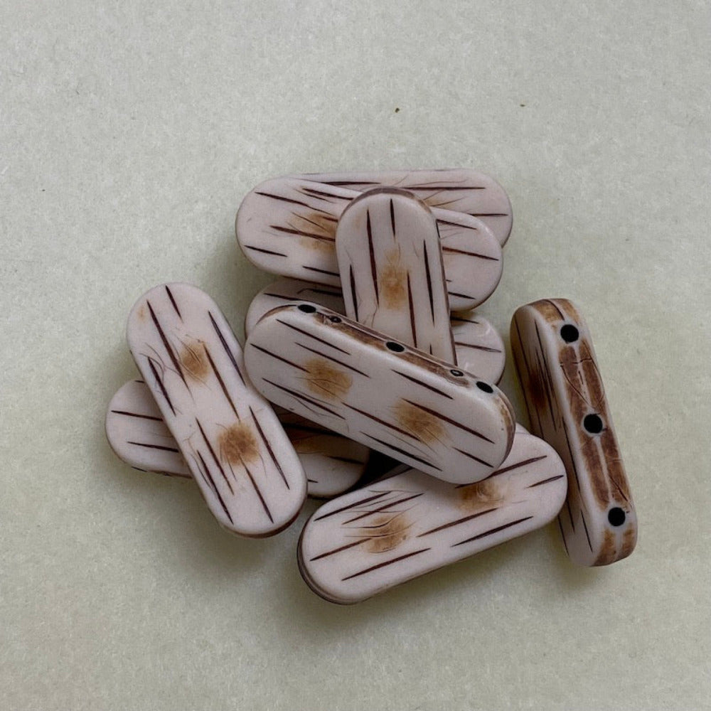 bone look flat beads with 3 threading holes