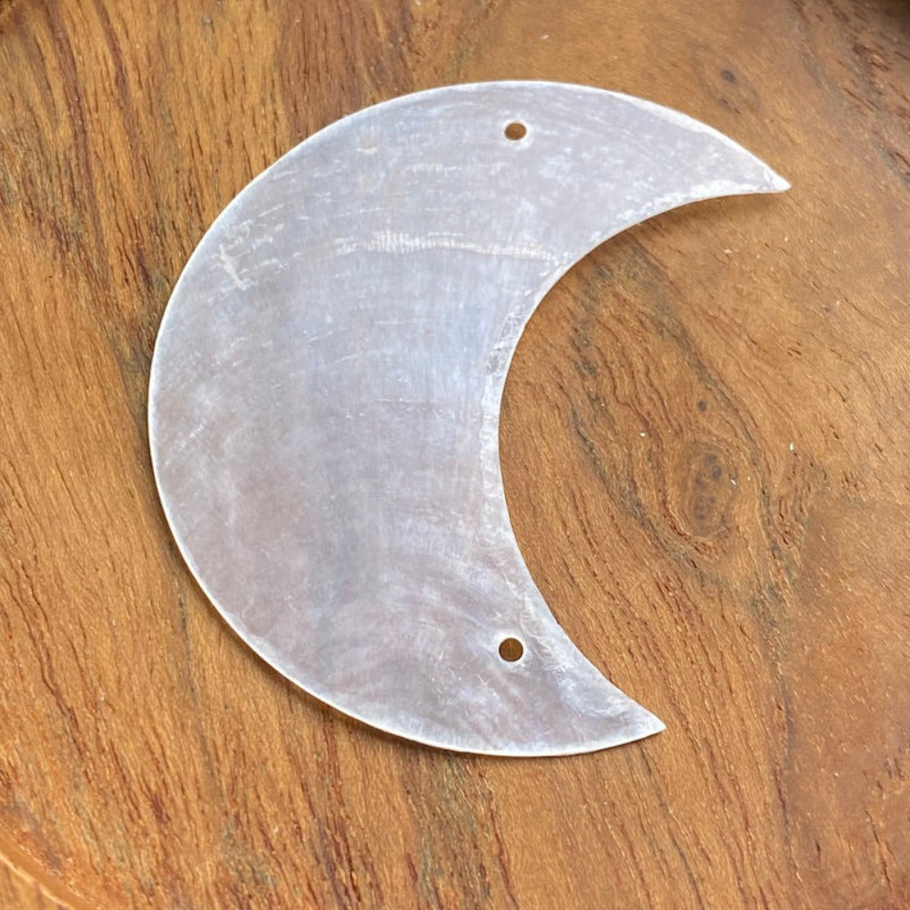 Moon shape capiz shell for the purpose of hanging decoration craft and decor with two holes drilled