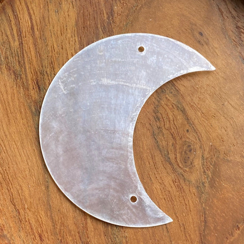 Moon shape capiz shell for the purpose of hanging decoration craft and decor with two holes drilled