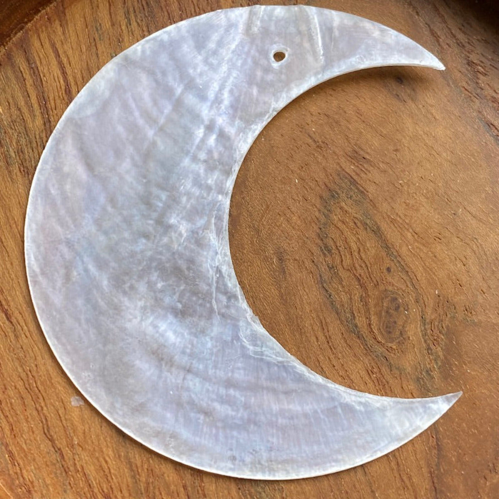 Moon shape capiz shell for the purpose of hanging decoration craft and decor with one hole drilled