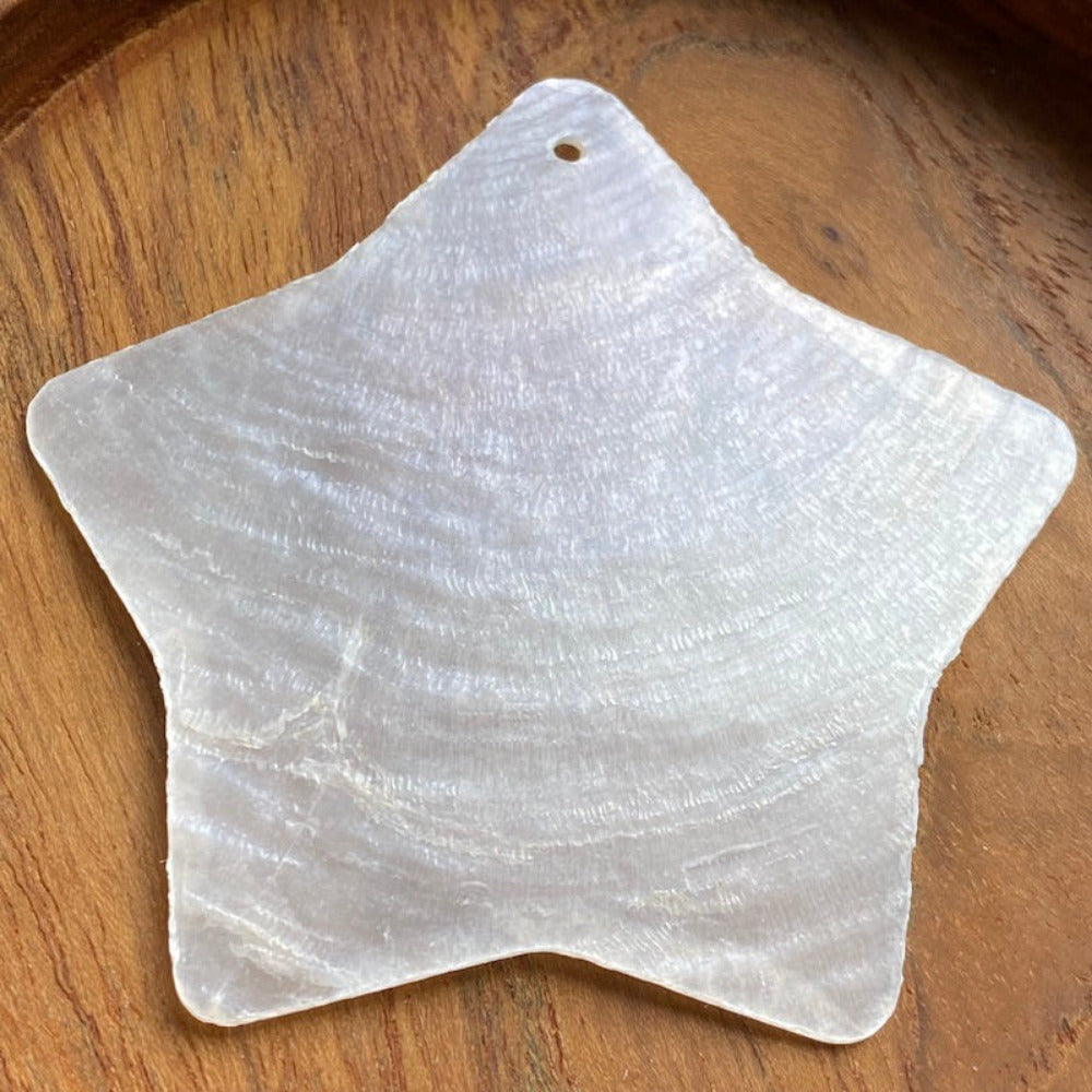 star shape capiz shell for the purpose of hanging decoration, christmas and craft and decor with one holesdrilled