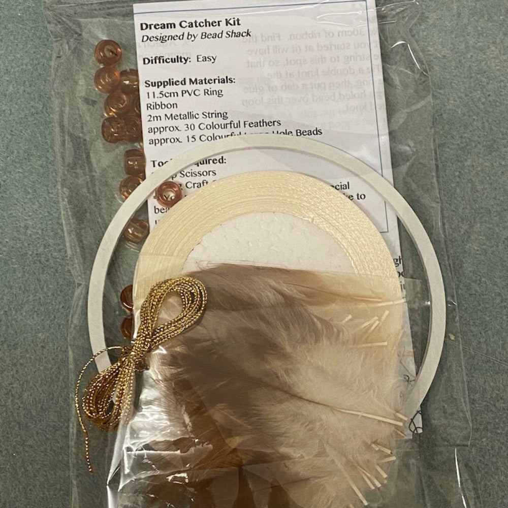 close up photo of a packed kit with written instructions showing colours of items inside the clear cellophane bag