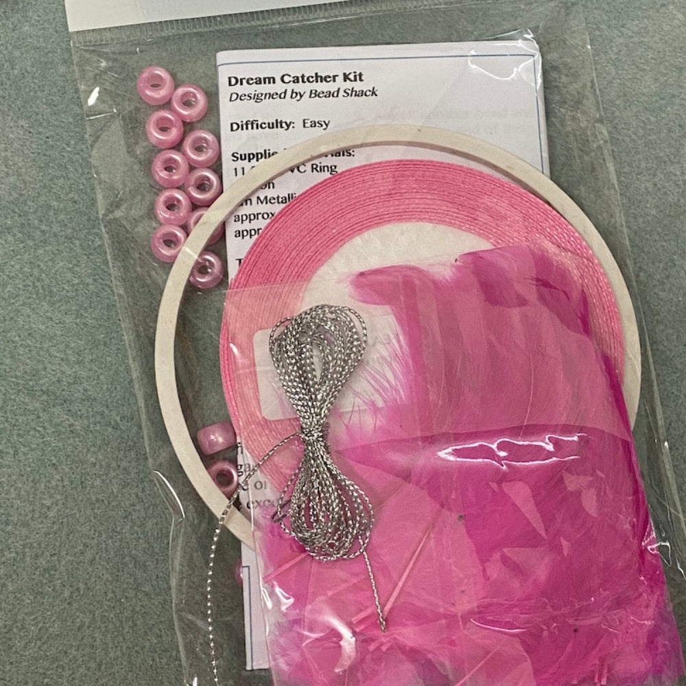 close up photo of a packed kit with written instructions showing colours of items inside the clear cellophane bag