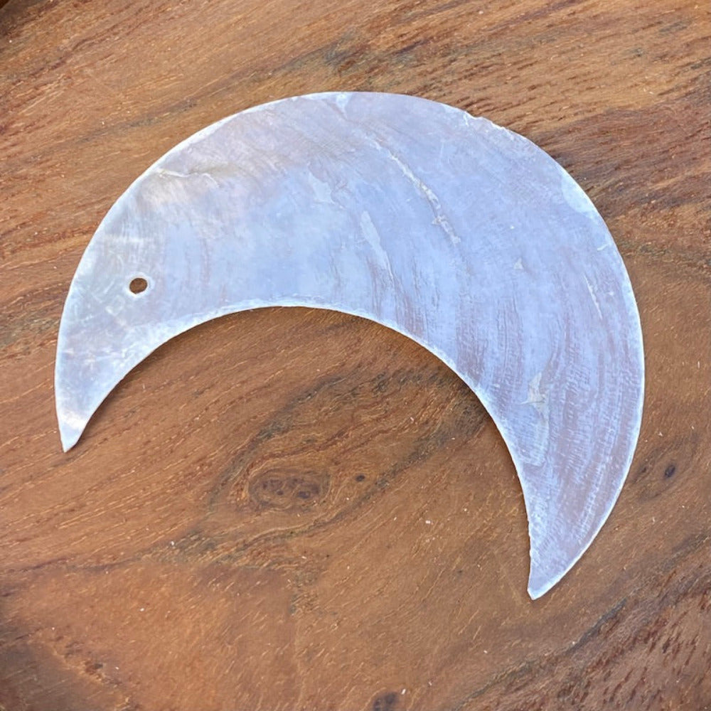 Moon shape capiz shell for the purpose of hanging decoration craft and decor with two holes drilled