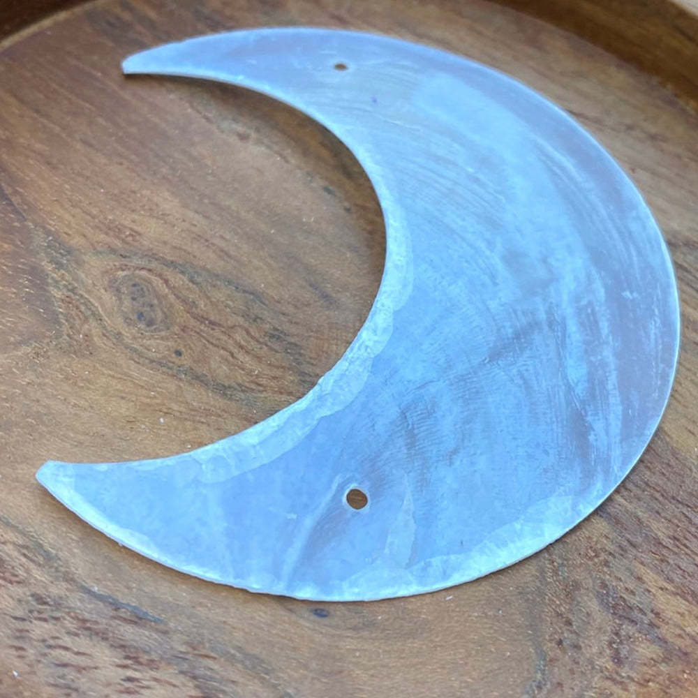 Moon shape capiz shell for the purpose of hanging decoration craft and decor with two holes drilled