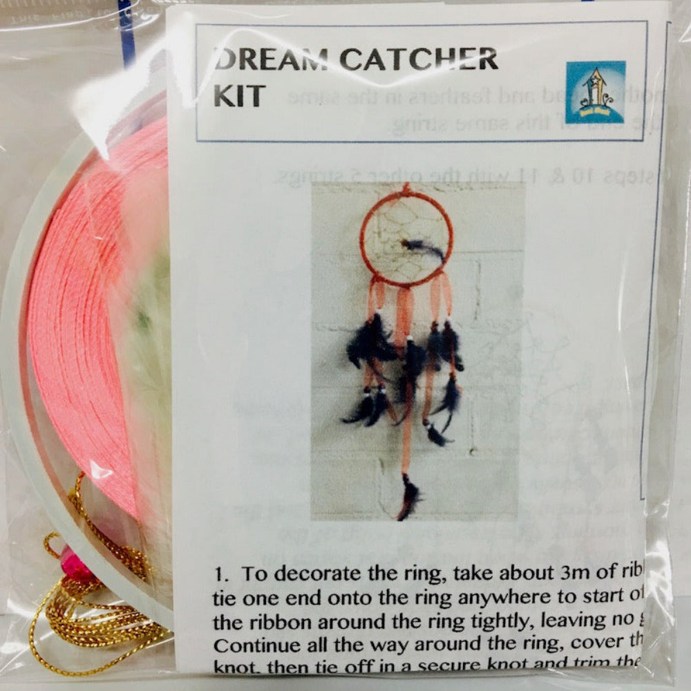 close up photo of a packed kit with written instructions showing colours of items inside the clear cellophane bag