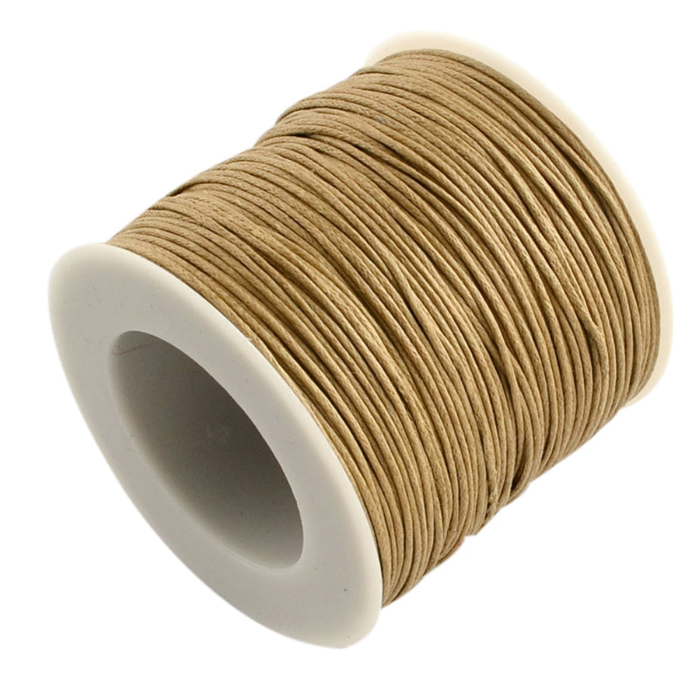 A spool of natural colour wax cotton cord used for crafting and jewelry making.