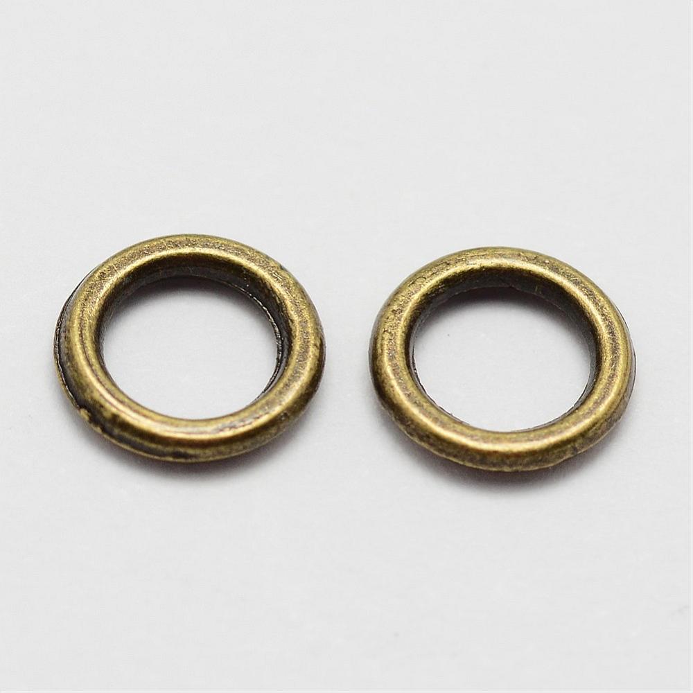 7mm Closed Jumpring (50) - Ancient Gold