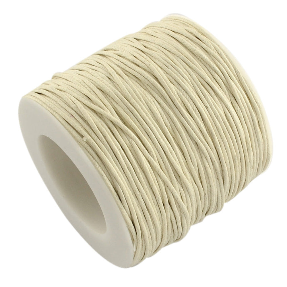 A spool of red wax cotton cord used for crafting and jewelry making.