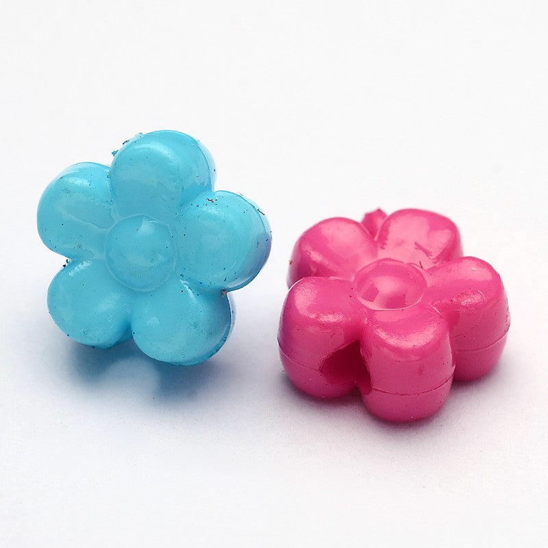 two solid colour plastic flower beads on a white background especially wonderful for the kids to bead with