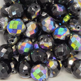 Multicolored faceted beads on a white background