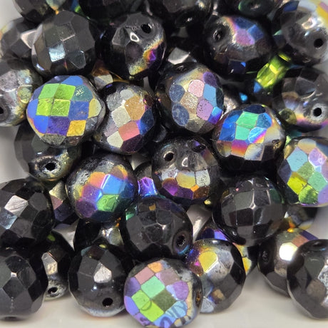 Multicolored faceted beads on a white background