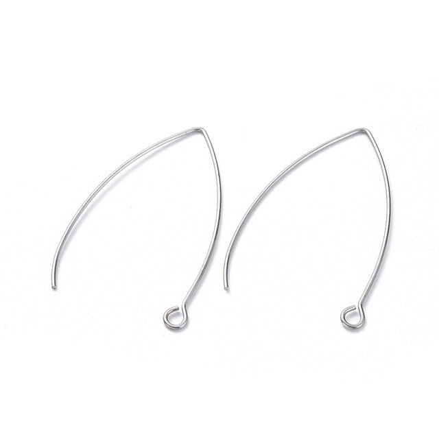close up of a pair of large silver anti tarnish ear wires with a white background 