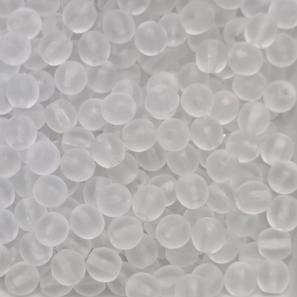 matte transparent glass round beads in a group