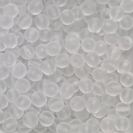matte transparent glass round beads in a group