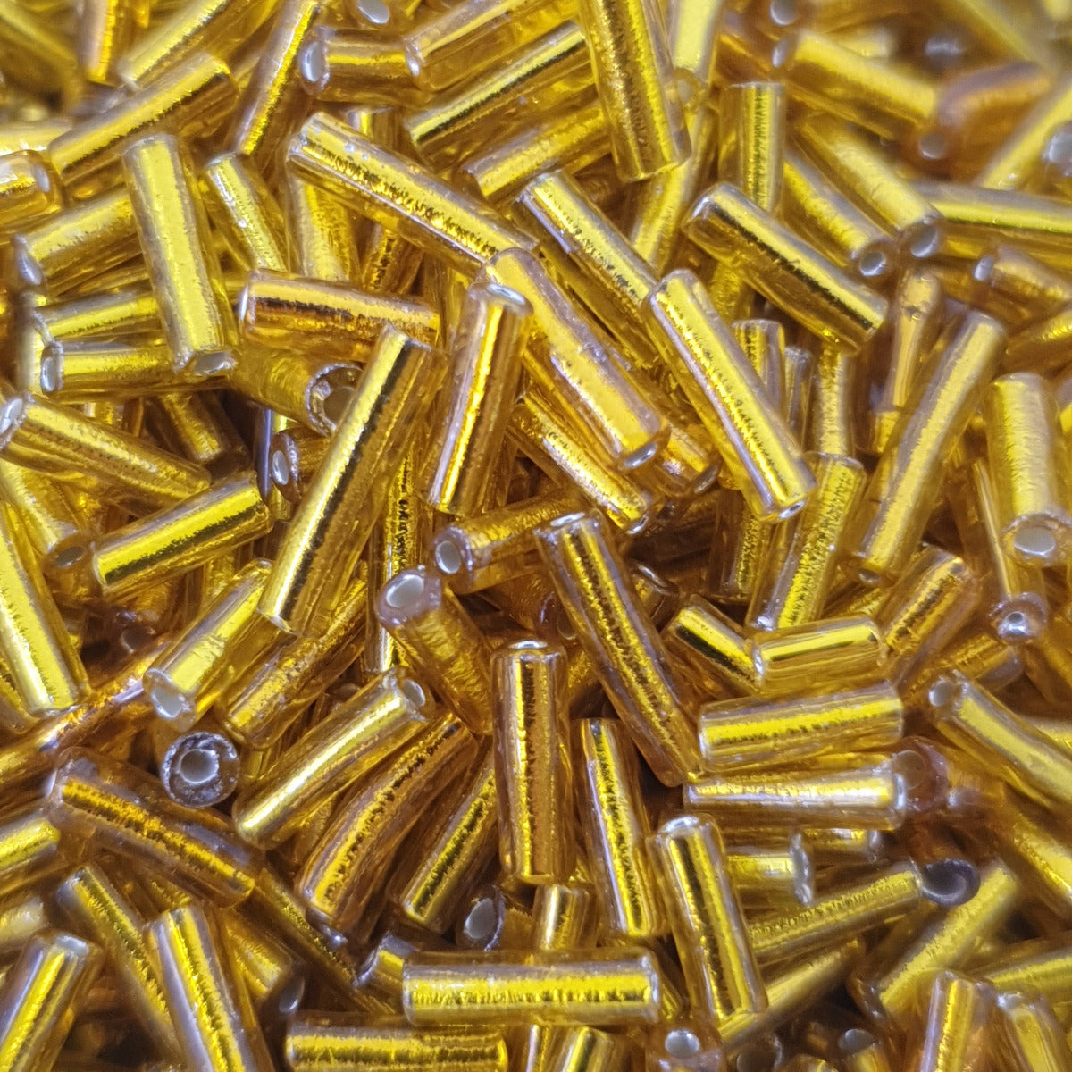 Dark Yellow - 6mm Silverlined (50g) - Bugle Seed Beads