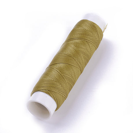 A roll of dark khaki colored waxed polyester cord.