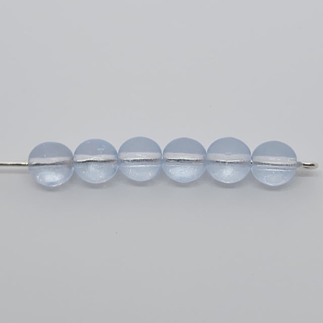 pale blue glass beads on a pin