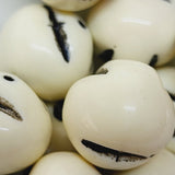 18mm Nut (10) - Antique Ivory w. Black - Bakelite Vintage Beads