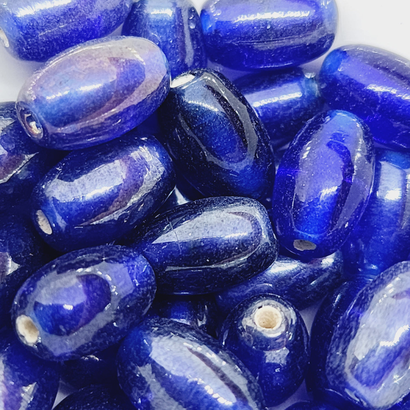 10x6mm Oval (50) - Transparent Sapphire Blue Lustre - Indian Glass Vintage Beads