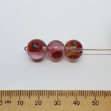 11x12mm Round (10) - Clear w. Pink Crumb - Glass Vintage Replica Trade Beads