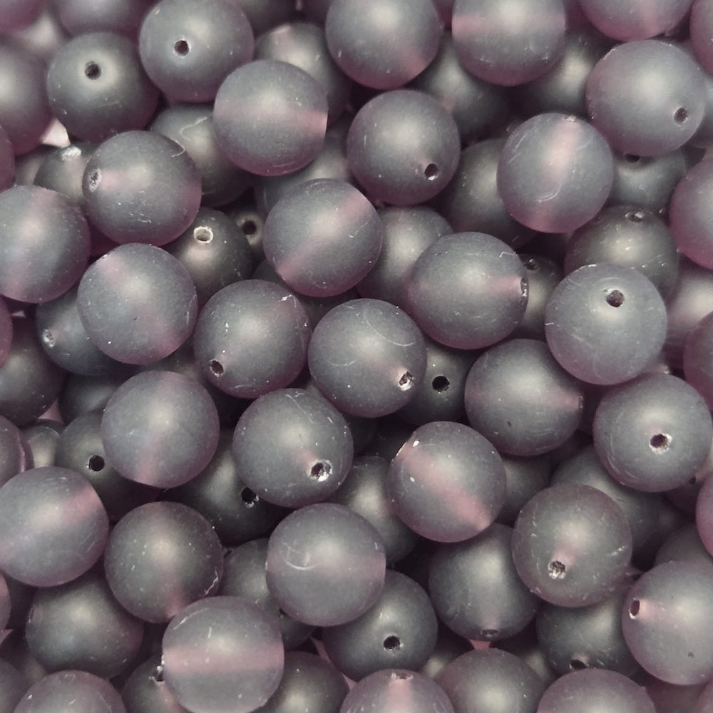 Close-up of purple beads with a soft focus