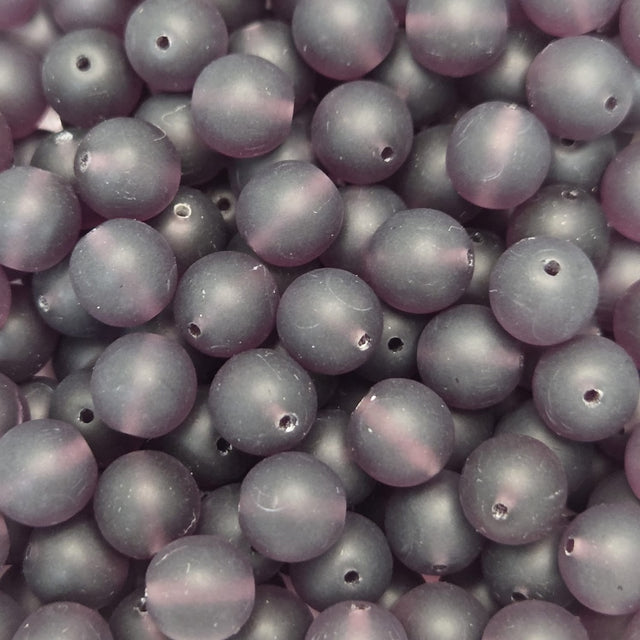 Close-up of purple beads with a soft focus