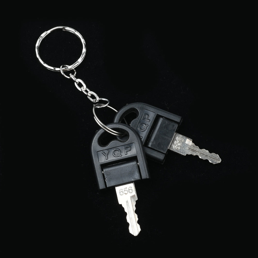 Keychain with two keys on a black background