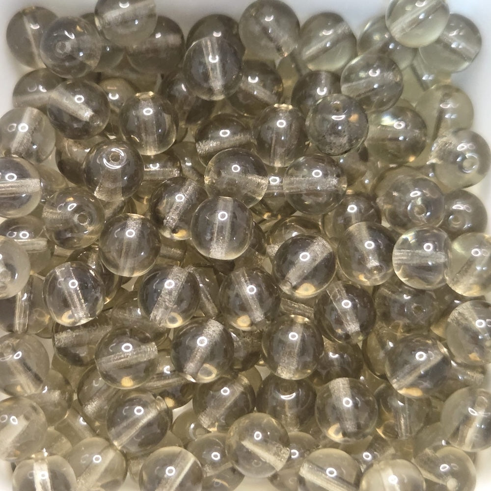 gray transparent round beads in a group