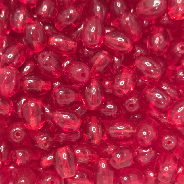 Close-up of red transparent oval beads