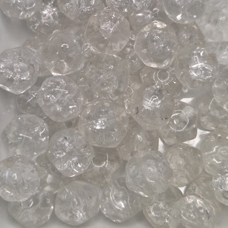 Close-up of clear crackle effect glass beads on a white background