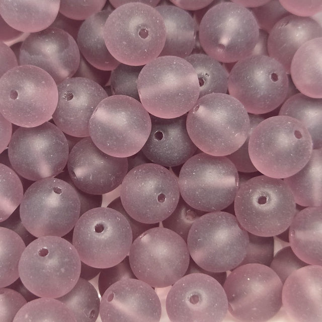 Close-up of purple beads with a soft focus