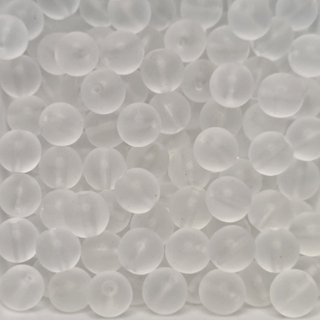 matte transparent glass round beads in a group