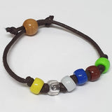 handmade cord bracelet showing colourful beads and knots for the purposes of educating children on the world water cycle