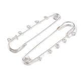 Kilt Pins in silver tone with 5 loops for threading beads and charms on a white background