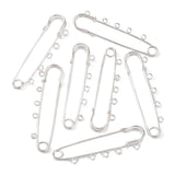 Kilt Pins in silver tone with 5 loops for threading beads and charms on a white background