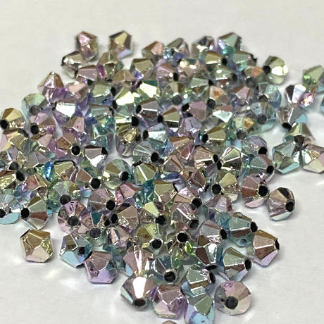 A collection of pastel rainbow bicone acrylic beads with a shine, suitable for crafting and jewelry making.