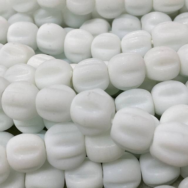 white glass beads with a glossy look