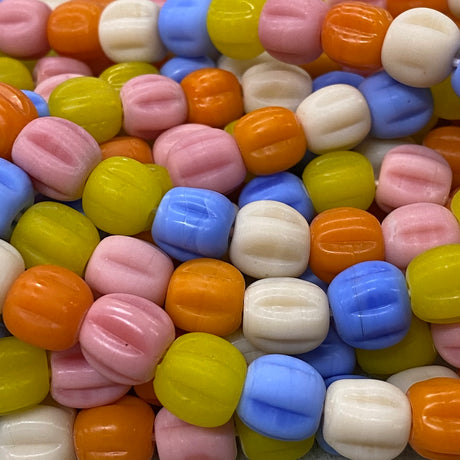 Close-up of colorful candy beads in various shapes and colors.