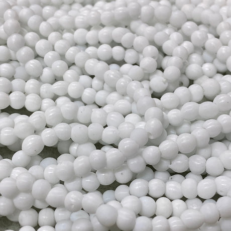 Close-up of white glass beads