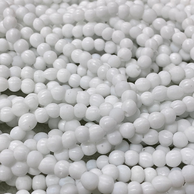 Close-up of white glass beads
