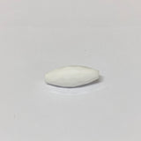 white faceted crystal beads on a grey background