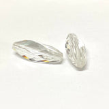 Two clear crystal faceted beads on a white background
