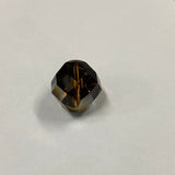 Faceted brown crystal beads on a light gray background