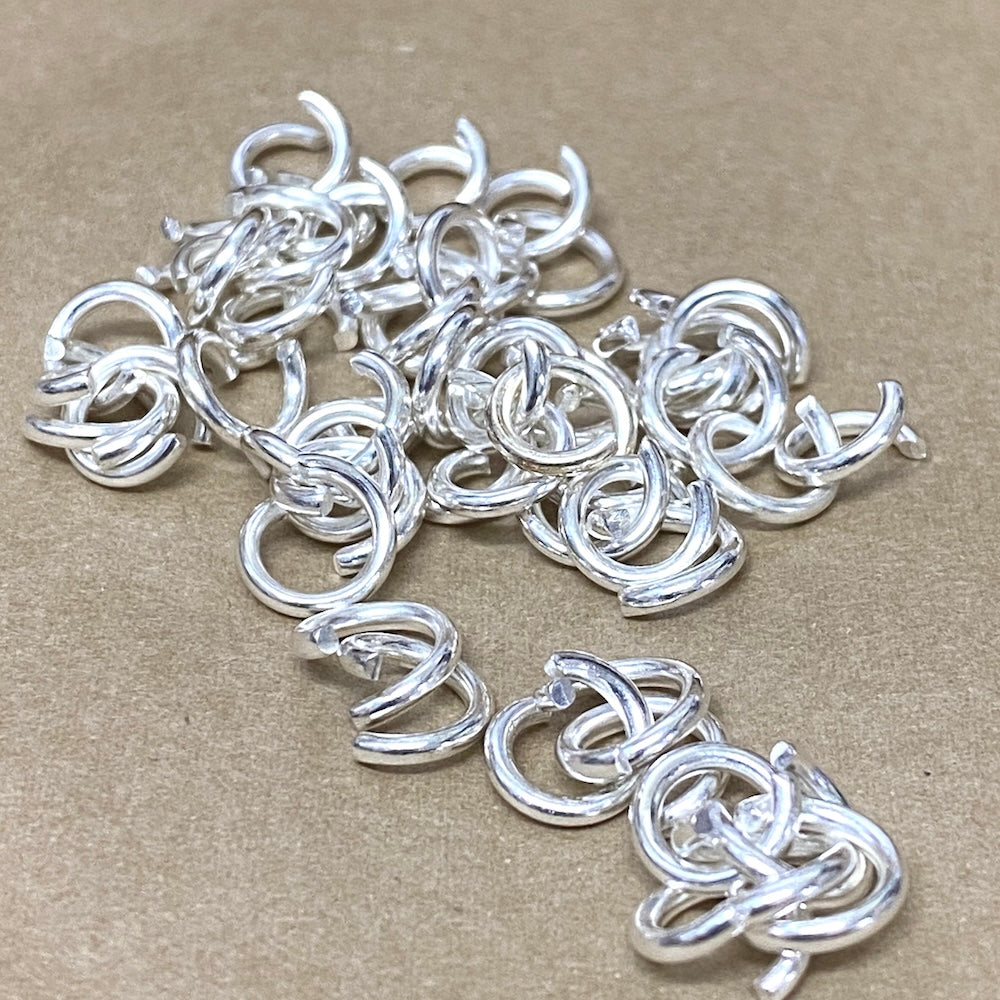 small metal joining jump rings to connect jewelry and craft items
