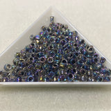 6/0 (#324) Black Rainbow Lined Transparent - 20g Tube - Bead Shack