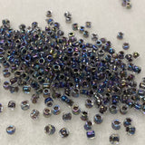 6/0 (#324) Black Rainbow Lined Transparent - 20g Tube - Bead Shack