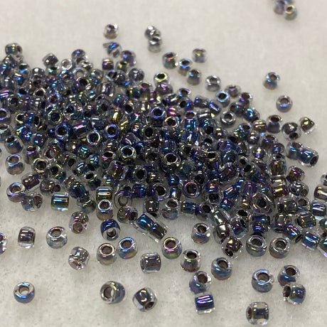 6/0 (#324) Black Rainbow Lined Transparent - 20g Tube - Bead Shack
