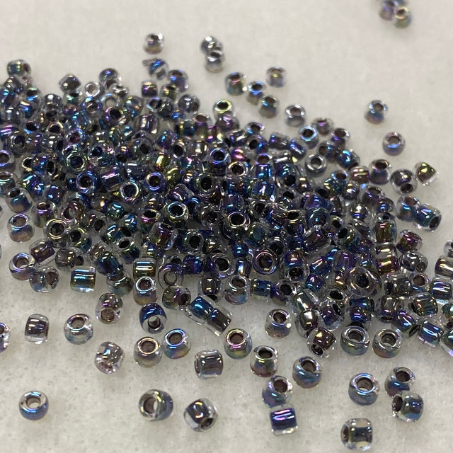 6/0 (#324) Black Rainbow Lined Transparent - 20g Tube - Bead Shack