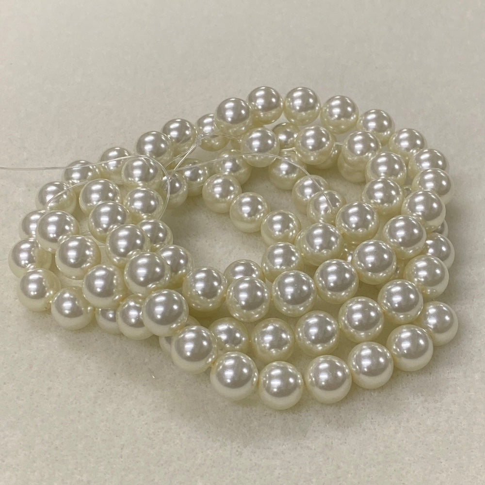 String of pearls on a light gray background